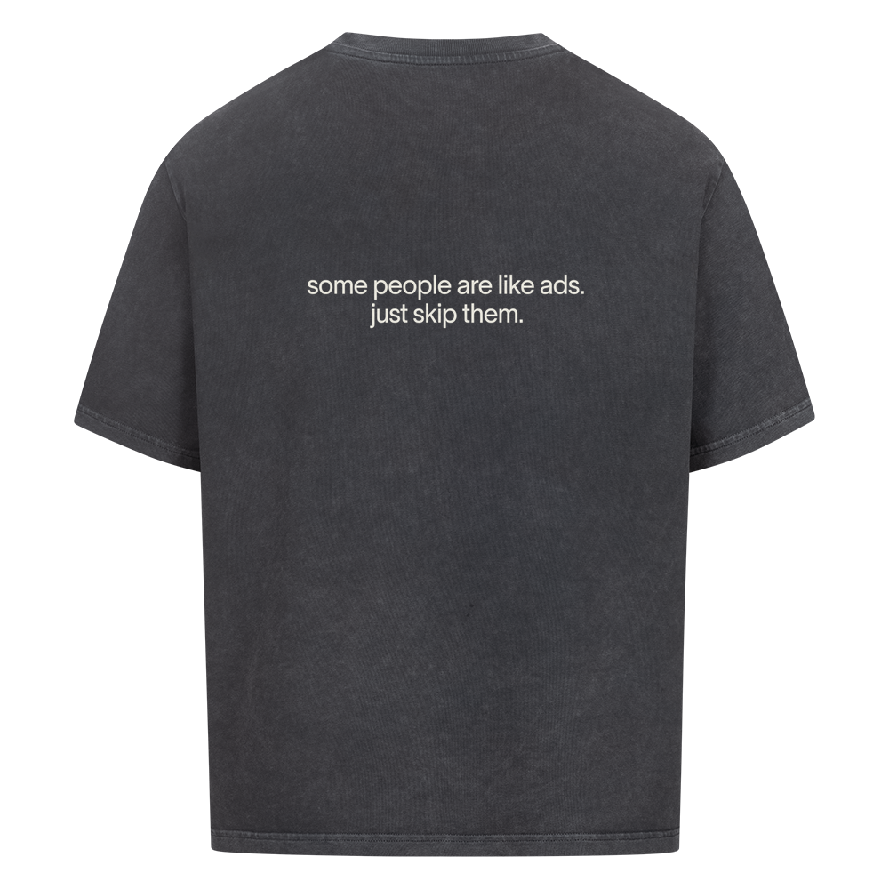 SKIP THEM — Oversized Tee in Washed Black, Rückenprint