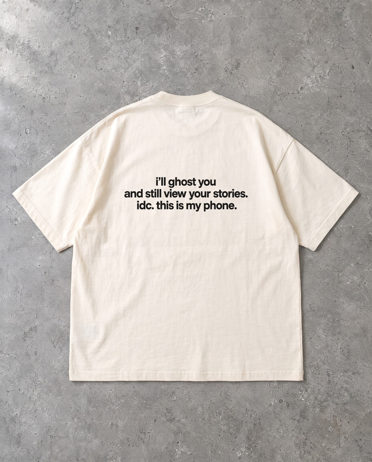 I'LL GHOST YOU — Oversized Tee in Natural Raw, Rückenprint, Flat-Lay