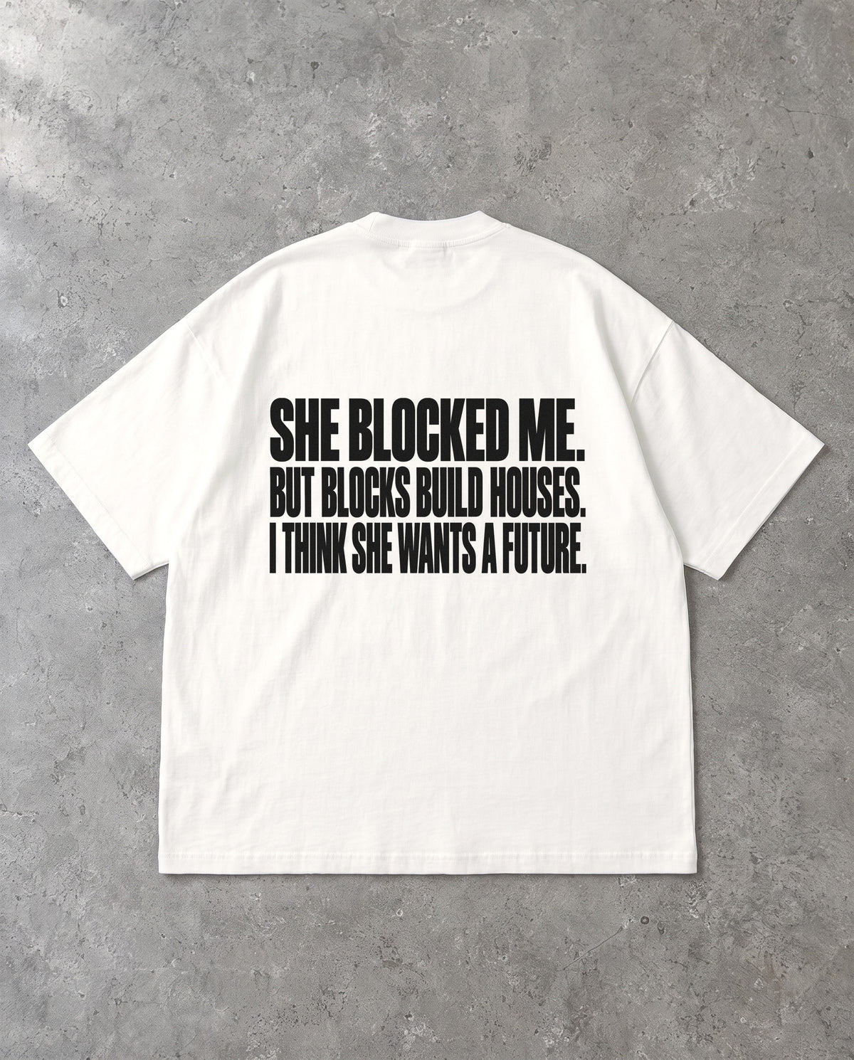 BLOCKS BUILD HOUSES — Oversized Tee in White, Rückenprint, Flat-Lay