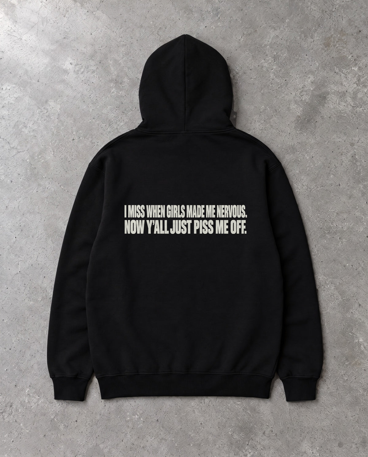 MADE ME NERVOUS — Oversized Hoodie in Black, Rückenprint, Flat-Lay