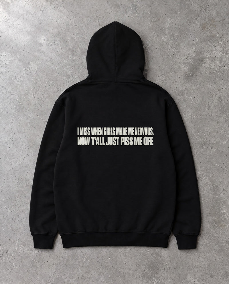 MADE ME NERVOUS — Oversized Hoodie in Black, Rückenprint, Flat-Lay