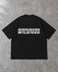 MADE ME NERVOUS — Oversized Tee in Black, Rückenprint, Flat-Lay
