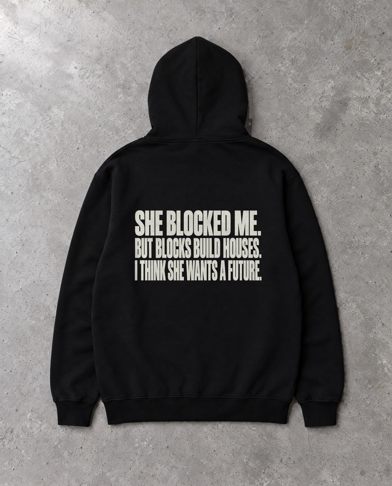 BLOCKS BUILD HOUSES — Oversized Hoodie in Black, Rückenprint, Flat-Lay