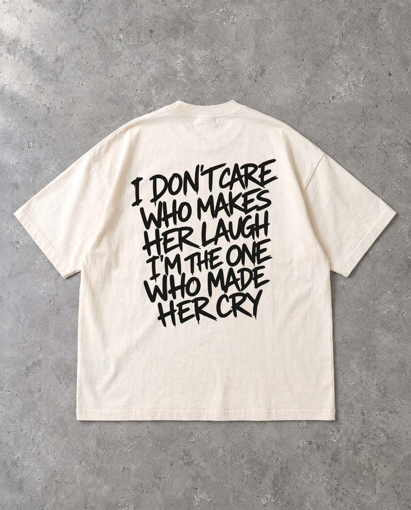 I DON'T CARE — Oversized Tee in Natural Raw, Rückenprint, Flat-Lay