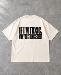 STILL OBSESSED — Oversized Tee in Natural Raw, Rückenprint, Flat-Lay