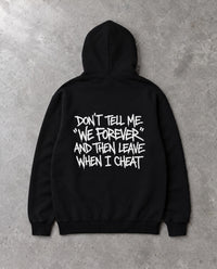 DON'T TELL ME — Oversized Hoodie in Black, Rückenprint, Flat-Lay