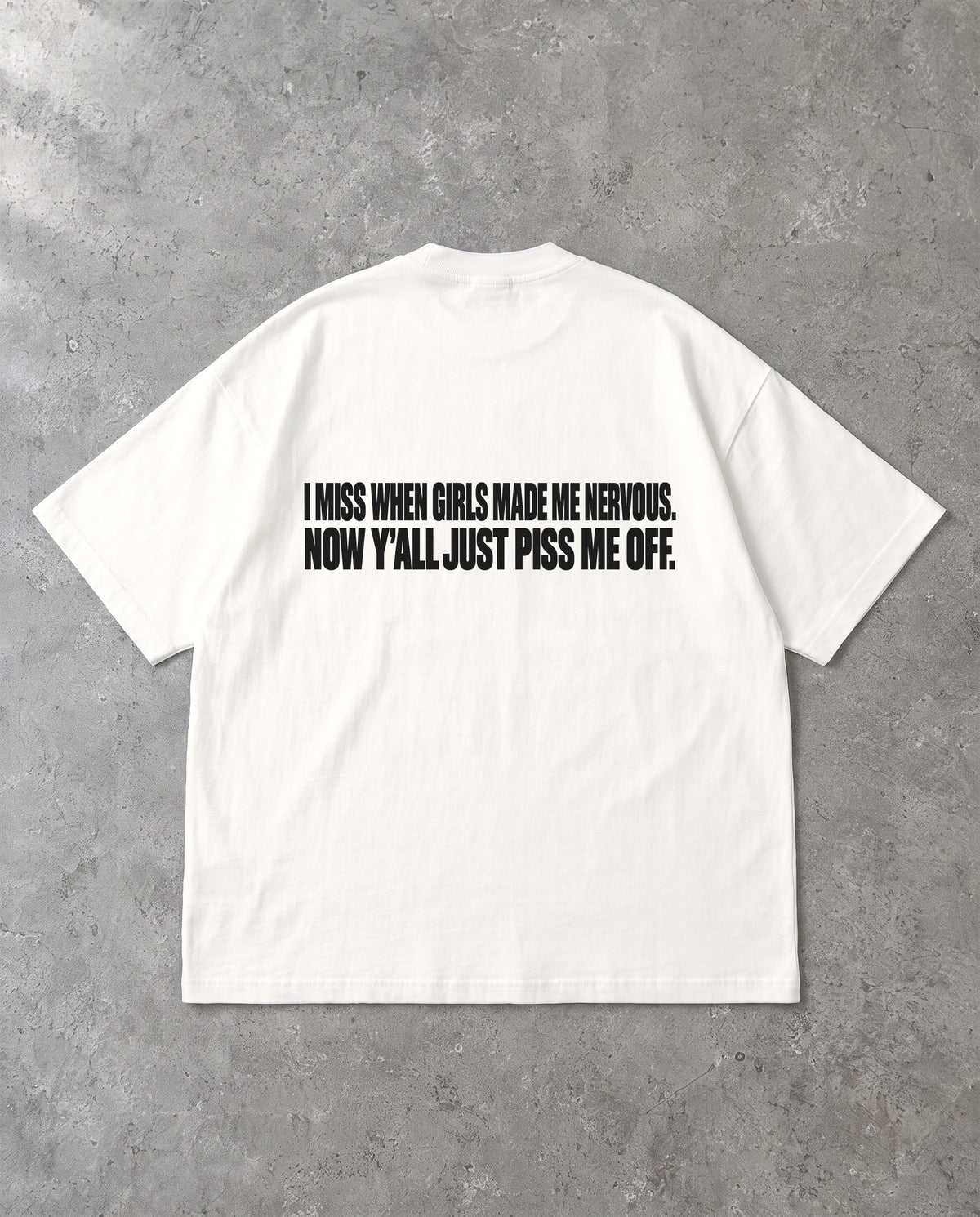 MADE ME NERVOUS — Oversized Tee in White, Rückenprint, Flat-Lay